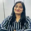 Professional academic-style portrait of Dr. Niti Sharma, neutral background, formal attire.