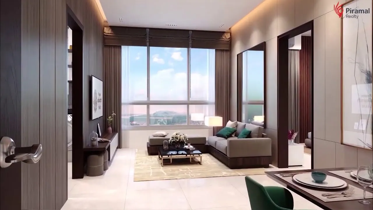 A family tours their new home with a real estate agent in a modern kitchen setting.