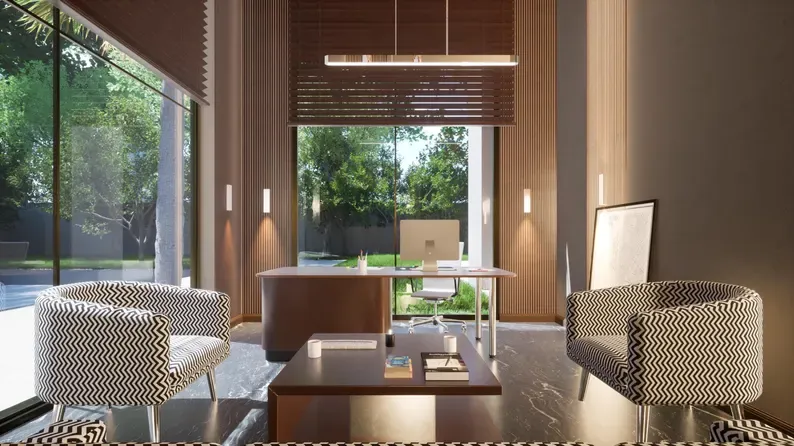 A real estate agent taking pictures of a modern, empty house interior.