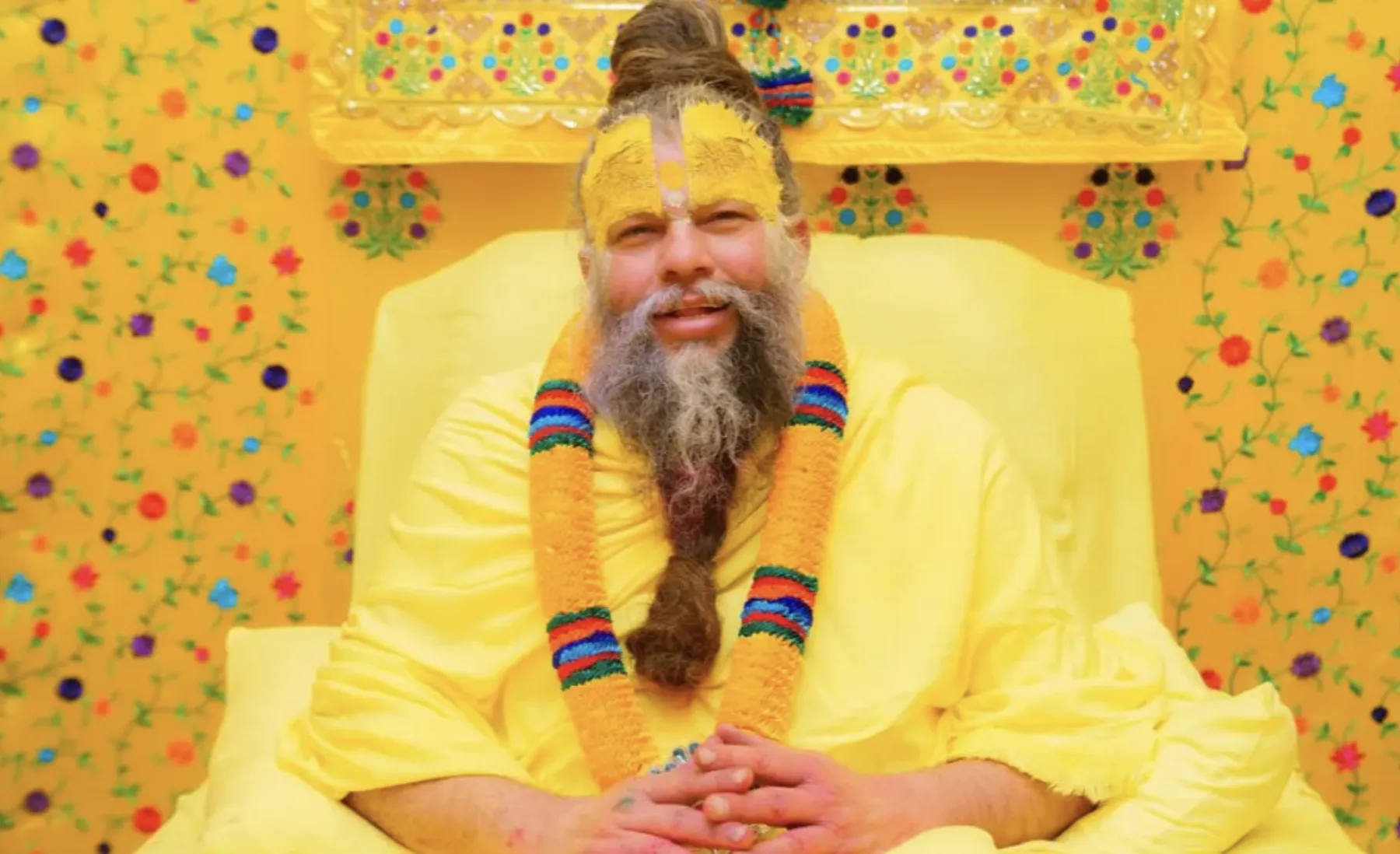 Vibrant display of deity statues adorned in traditional attire at ISKCON, Dhaka.
